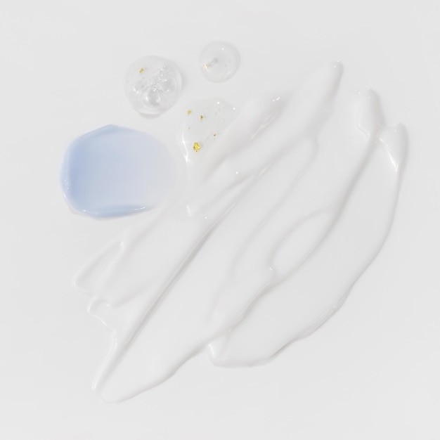 composition of various cosmetic mask creams serum and lotion smear beauty texture