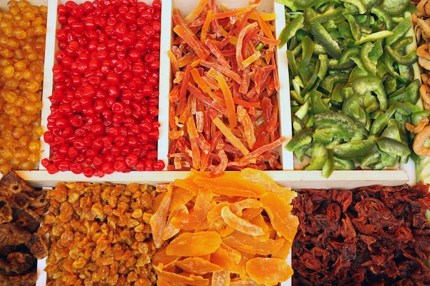 a composition of various dried fruit on a market