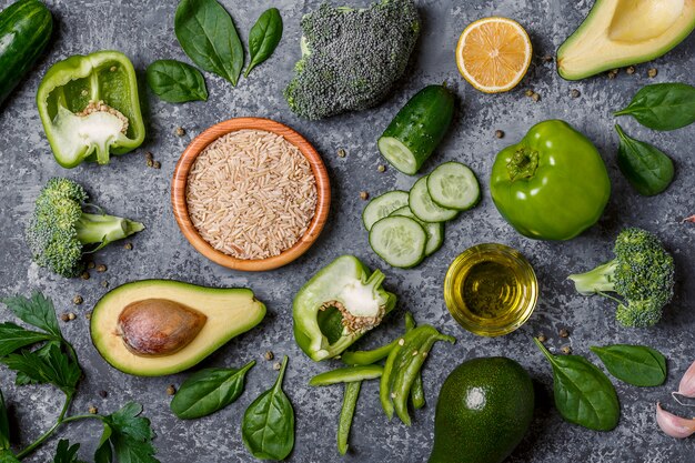 Composition vegetarian, diet foods - green vegetables, rice and olive oil