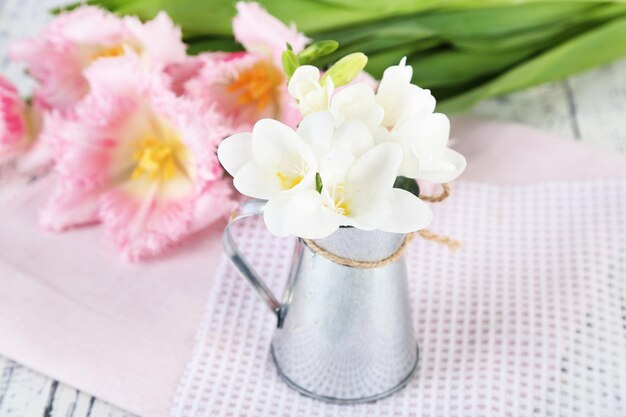 Composition with beautiful  flowers on wooden background