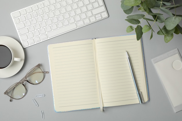 Composition with business accessories on gray. Blogger workspace