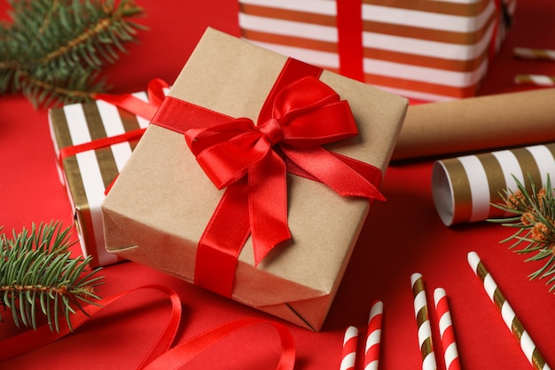 Composition with Christmas accessories on red table