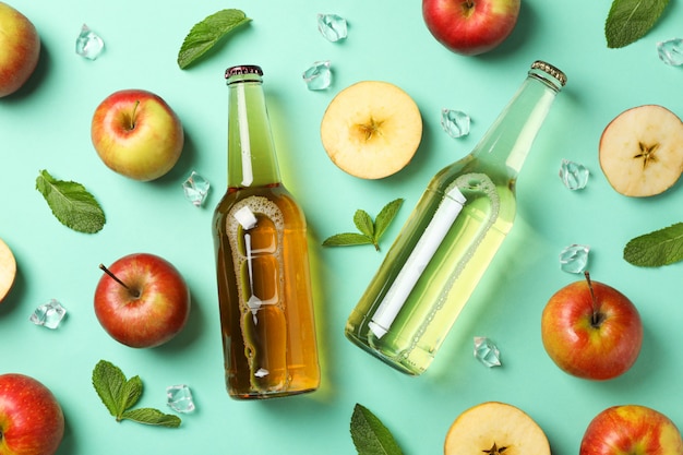 Composition with cider, apples and ice on mint