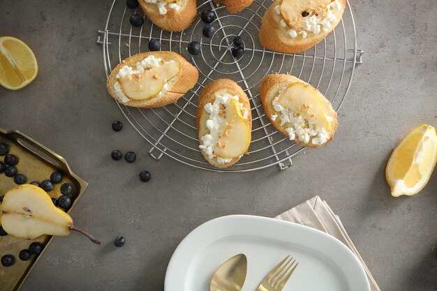 Composition with delicious sweet toasts on table