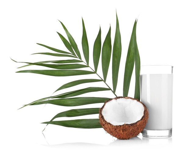 Composition with fresh coconut milk on white background