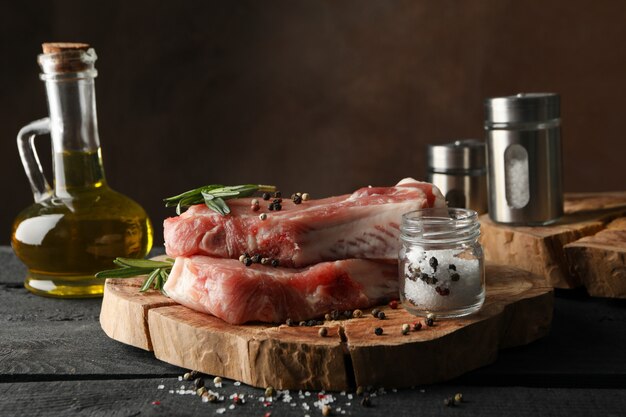 Photo composition with raw meat and ingredients. cooking steak concept