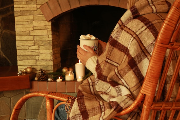 Composition with rocking chair in cozy winter evening