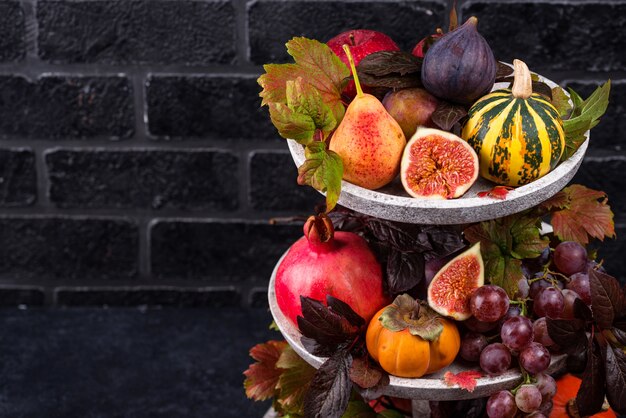 Composition with seasonal autumn fruits.