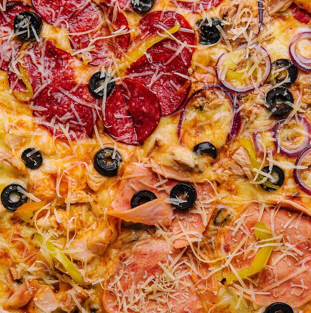 Composition with slices of different delicious pizzas