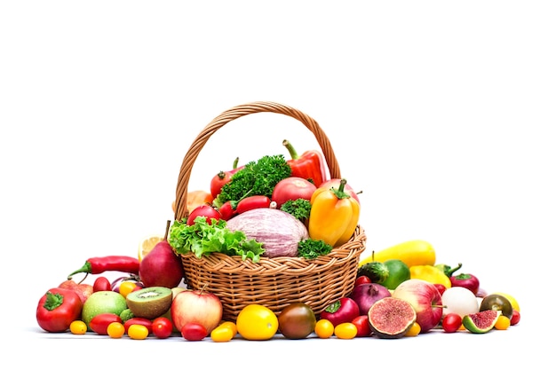 Composition with vegetables and fruits in wicker basket