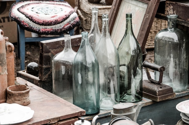 Composition with vintage bottles and another old things.