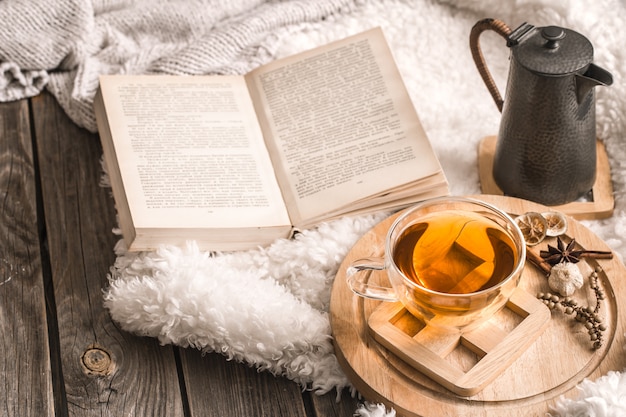 Composition with wooden letters and a Cup of tea