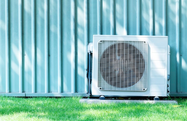 Compressors air conditioners on grass field