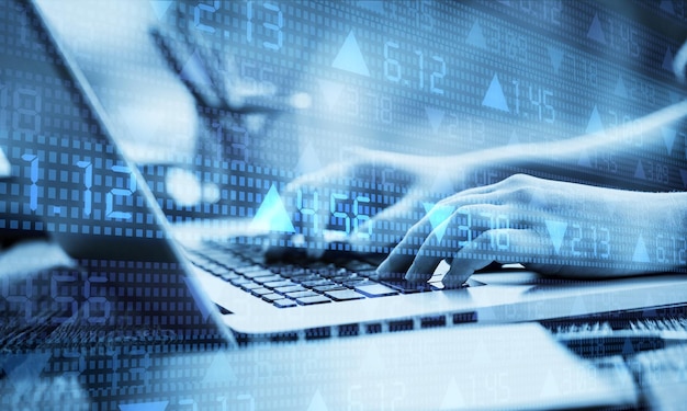 Computer calculations concept, human hands on the keyboard
