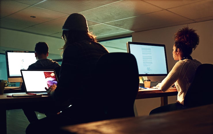 Photo computer coworking team or night people programming erp software cybersecurity system or online server code startup data center ai developer or back of programmer coding machine learning database