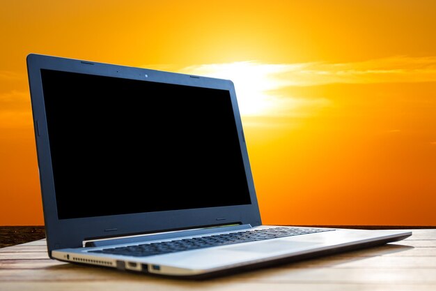 Computer on a desk on a black background