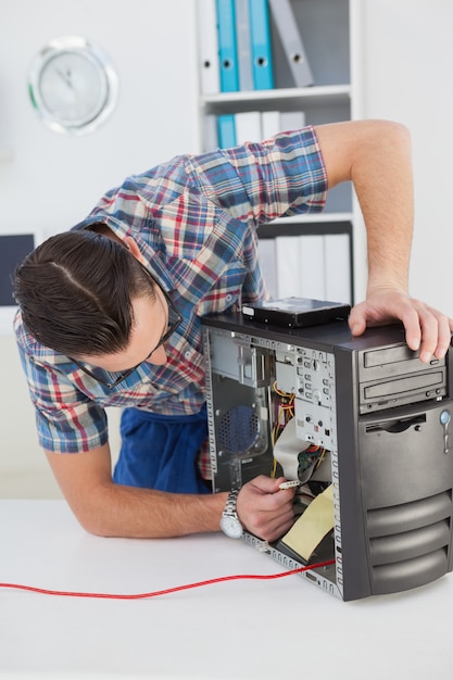 Computer engineer working on broken console