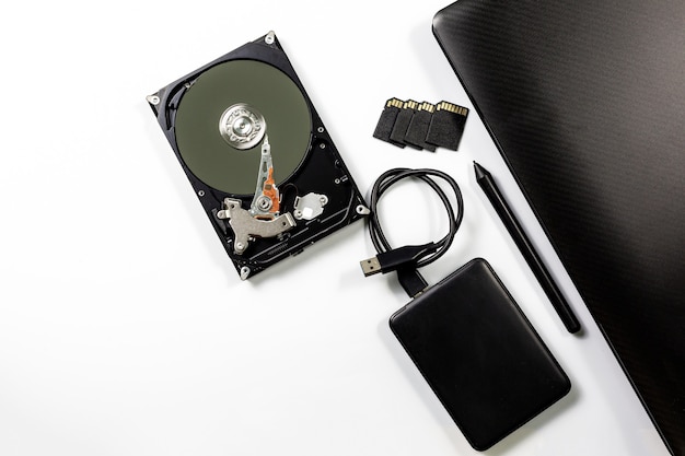 computer and hard disk device on white background