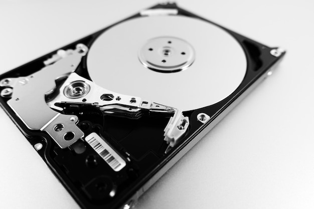 Computer hard drive with top cover removed Disassembled HDD of a personal computer Selective Focus