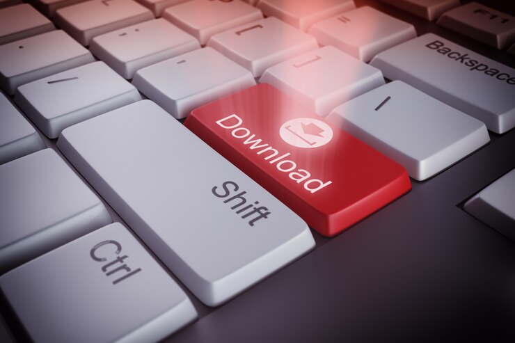 Photo ダウンロードの赤いキーが付いているコンピュータのキーボード