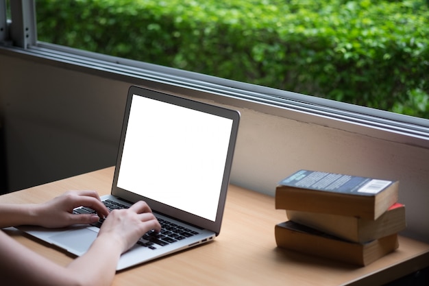 Photo computer laptop and old vintage book