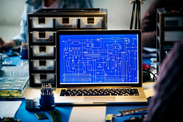 Computer laptop showing electronic circuit pattern