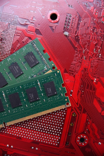 Computer memory ram on motherboard background . close up.\
system, main memory, random access memory, onboard, computer\
detail. computer components . ddr3. ddr4. ddr5