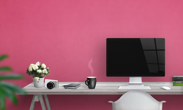 Computer met leeg scherm op bureau Vrije ruimte op muur voor tekst Roze muur op achtergrond