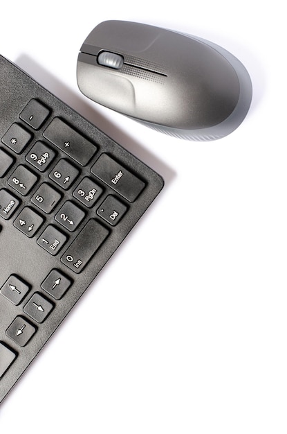 Computer mouse and keyboard on a white background Copy space