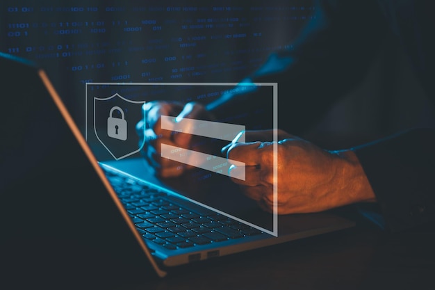 computer network security aggressive hacker fist on laptop