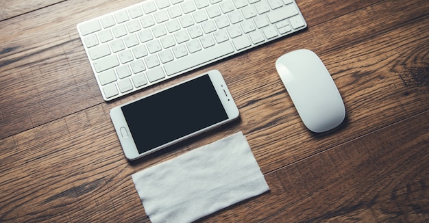 Computer  and phone with napkin