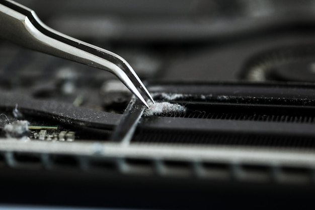 Photo computer repair concept close-up view.hardware. clearing notebook