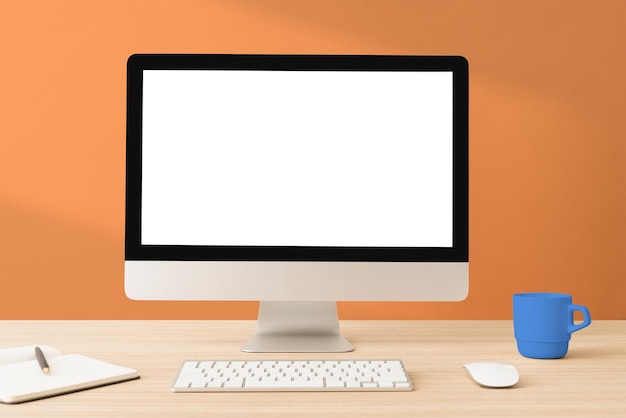 Computer scherm mockup png minimale werkruimte oranje muur met schaduwontwerp