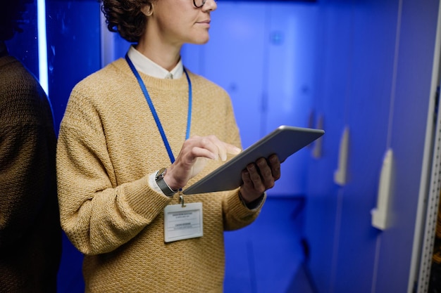 Photo computer server technician at work