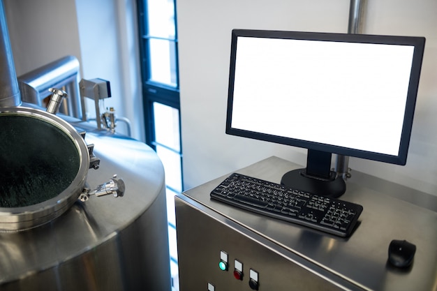 Computer on table at brewery