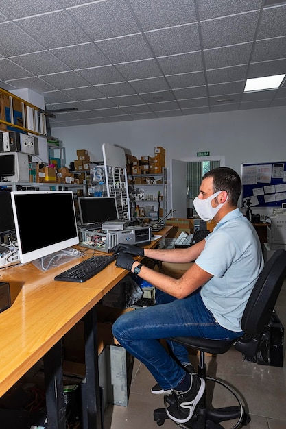 Photo computer technician working in workshop