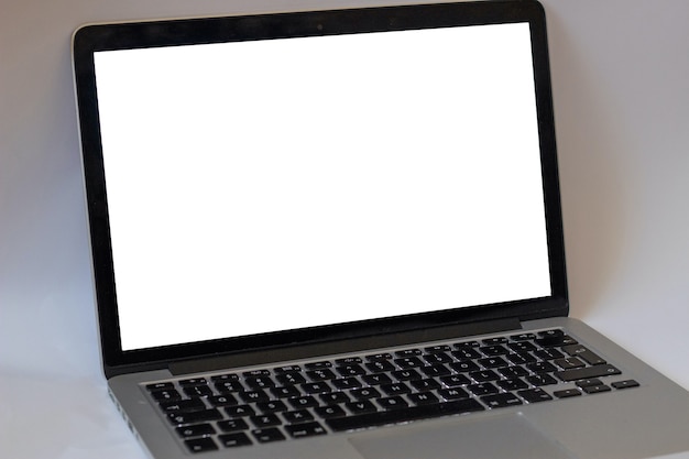 Computer on a white isolated background with a mock up screen