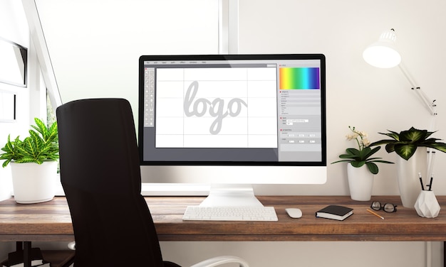 computer with logo creation software on table. 3d rendering