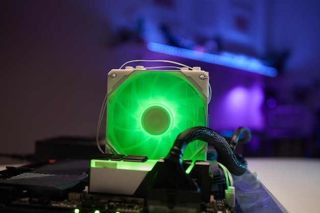 The computers system block components of a gaming pc with rgb illumination cooling fan with backligh