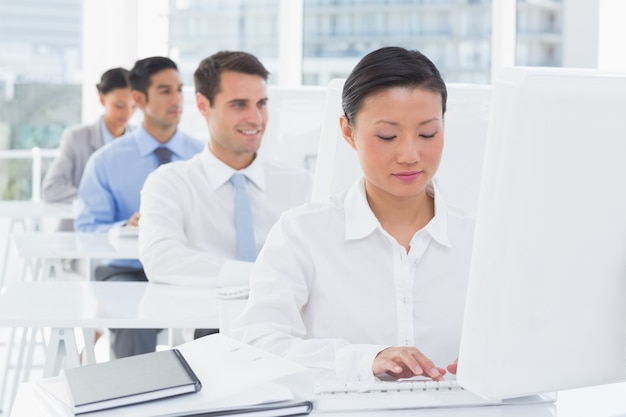 Concentrate work team using computer 