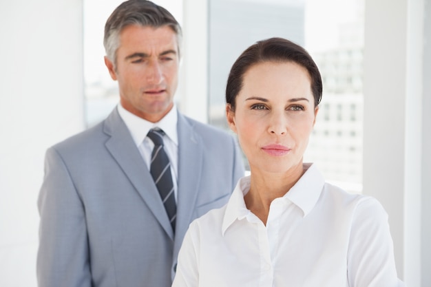 Concentrated businesswoman looking away