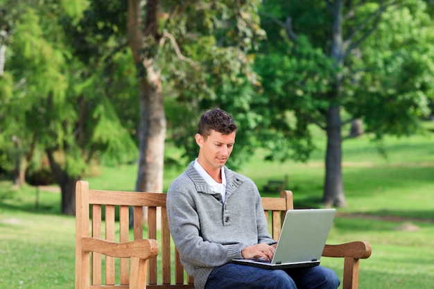 Concentrated man working on his laptop