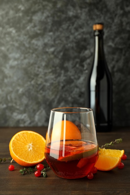 Concept of alcohol drink with Sangria on wooden table