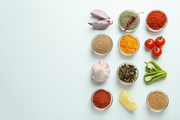 Concept of aromatic spices on white background