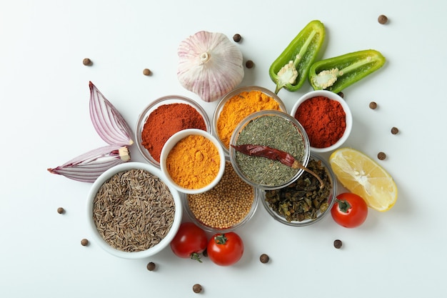 Concept of aromatic spices on white background