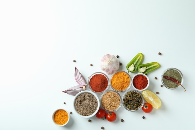 Concept of aromatic spices on white background