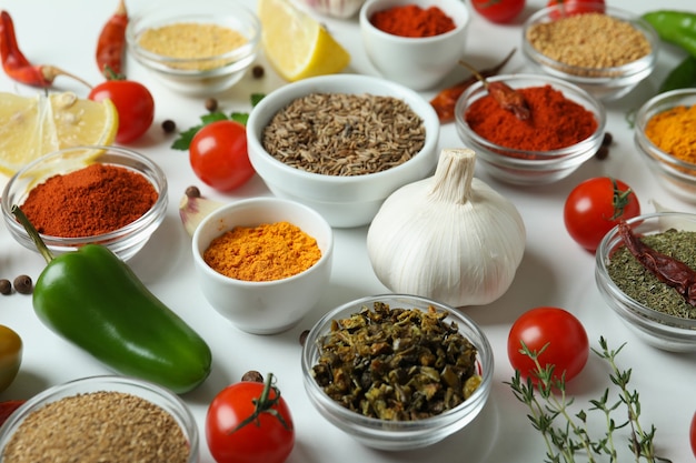 Concept of aromatic spices on white background