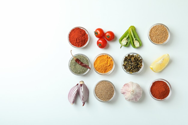 Concept of aromatic spices on white background