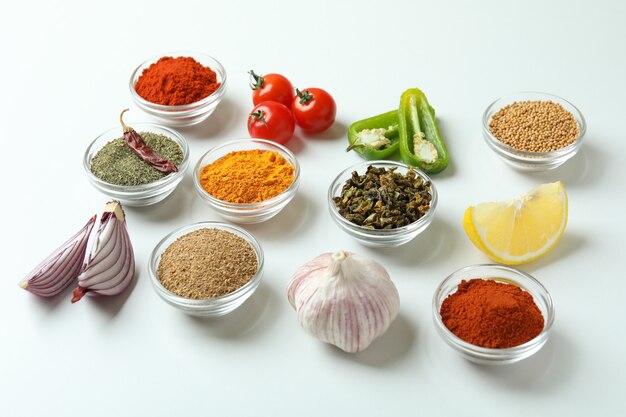 Concept of aromatic spices on white background