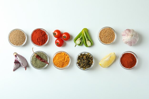 Concept of aromatic spices on white background